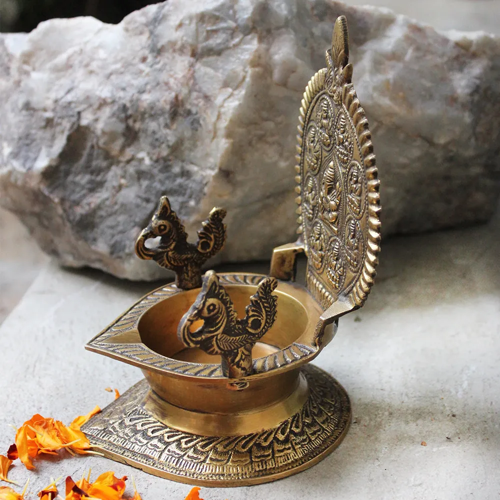 Traditional Ashtalakshmi Vilakku - Divine Brass Oil Lamp With Peacocks. Ht 19 cm x W 12 cm x L 15 cm