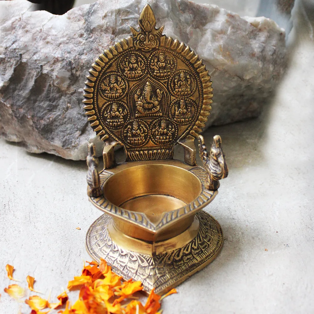 Traditional Ashtalakshmi Vilakku - Divine Brass Oil Lamp With Peacocks. Ht 19 cm x W 12 cm x L 15 cm