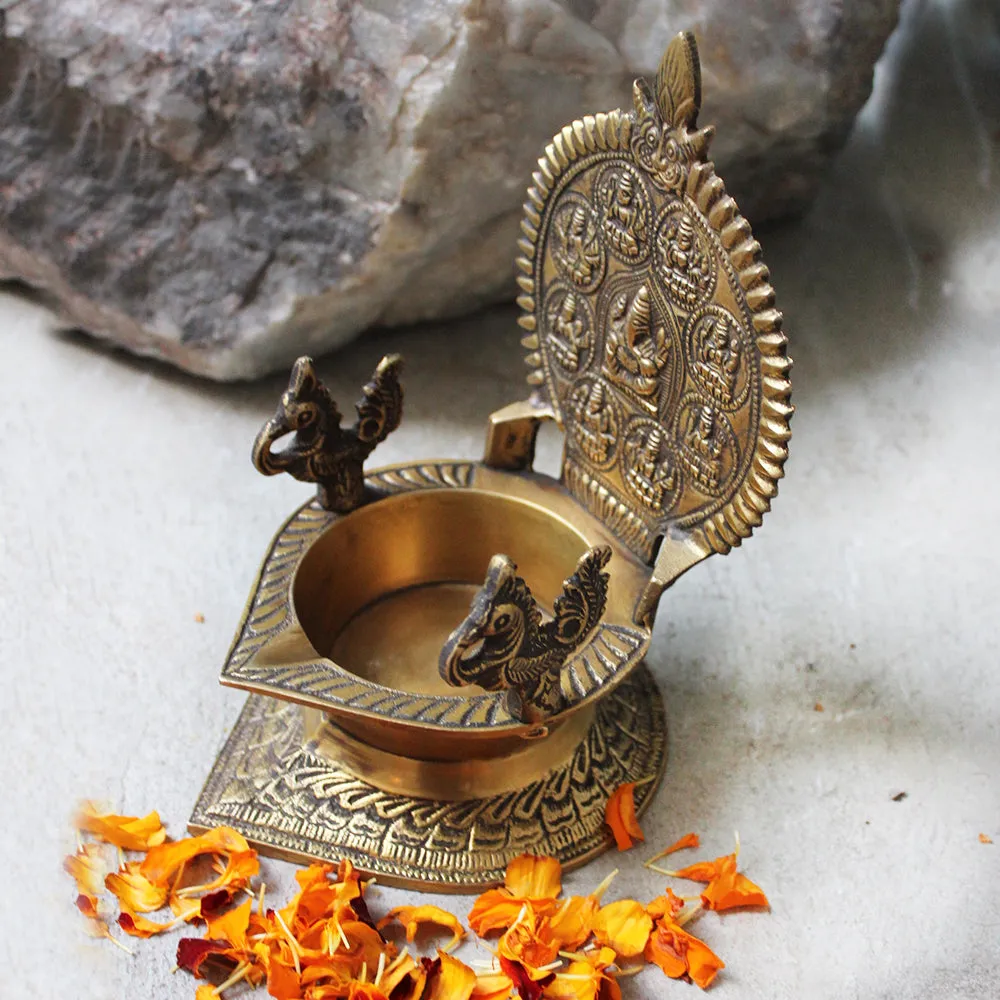 Traditional Ashtalakshmi Vilakku - Divine Brass Oil Lamp With Peacocks. Ht 19 cm x W 12 cm x L 15 cm