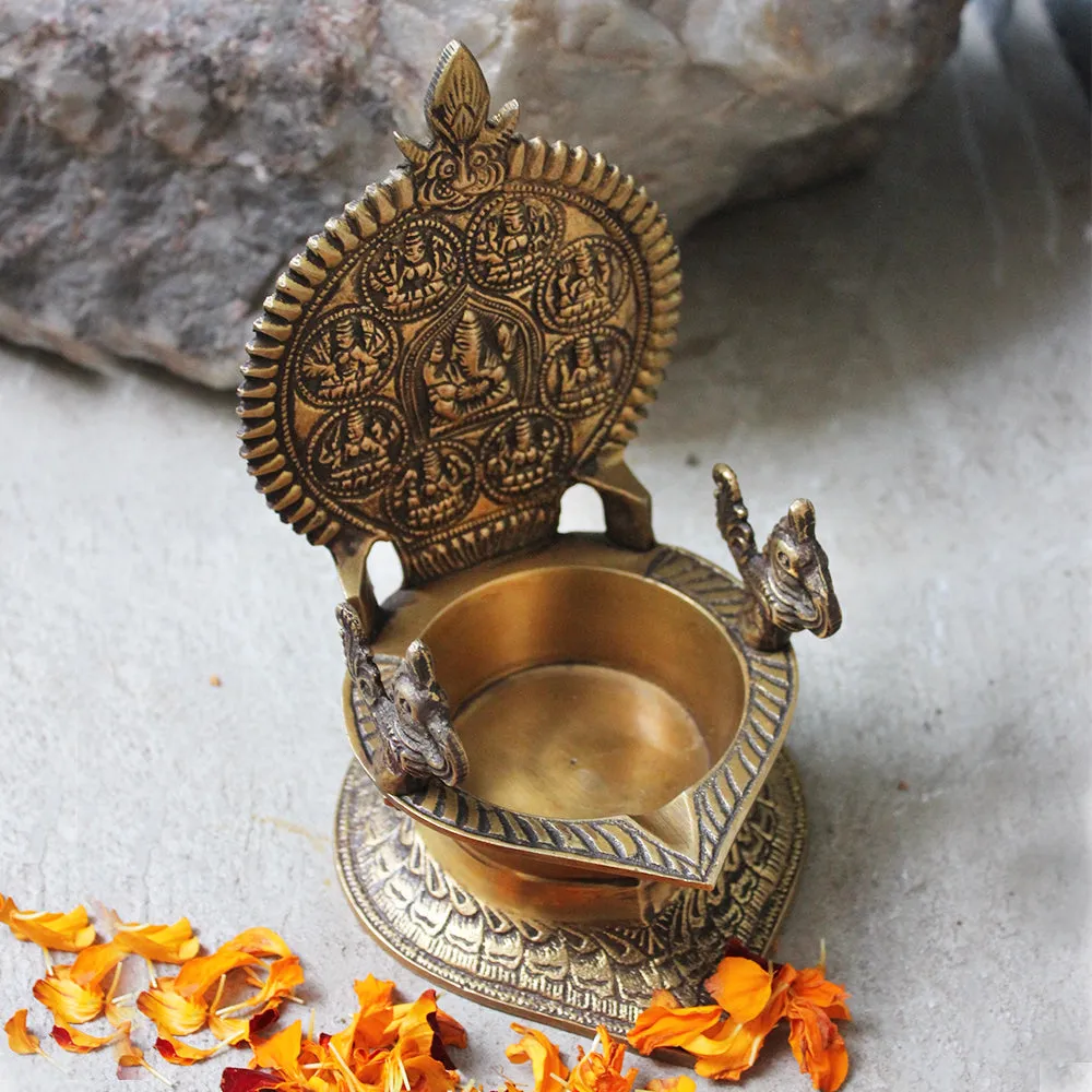 Traditional Ashtalakshmi Vilakku - Divine Brass Oil Lamp With Peacocks. Ht 19 cm x W 12 cm x L 15 cm